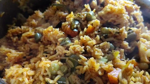 Indian Vegetable Pulao with Mixed Vegetables and Spiced Rice Close Up Stock-Footage 346875774