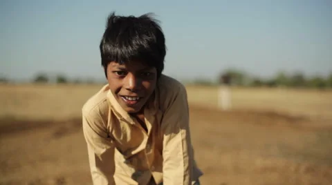 Indian village boy smiling, close up, shallow DOF Stock Footage