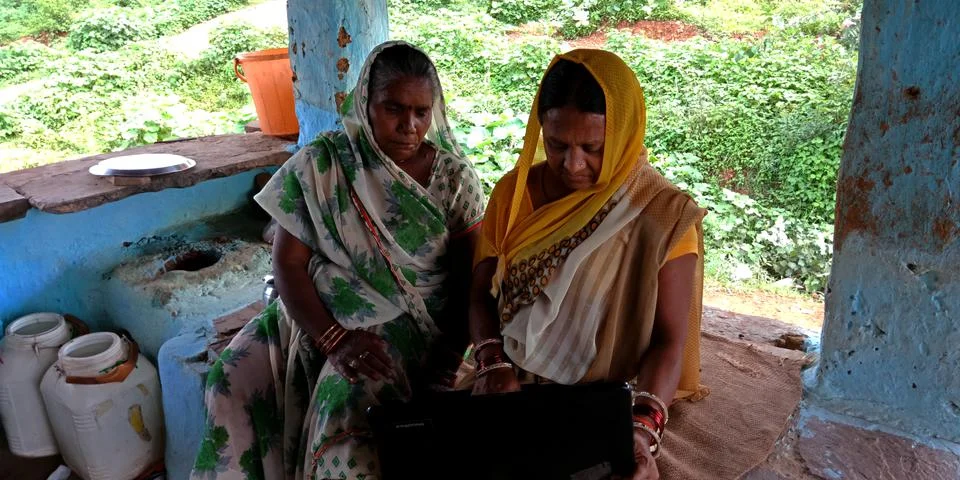 Indian villager technology learning program for digital awareness. Stock Photos