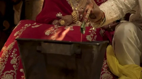 Indian Wedding Couple Taking Seven Vows Around Sacred Fire Stock Footage 337632115