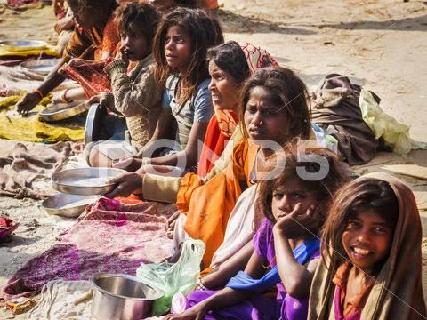 Indian Woman And Street Children Begging For Food, Allahabad, India