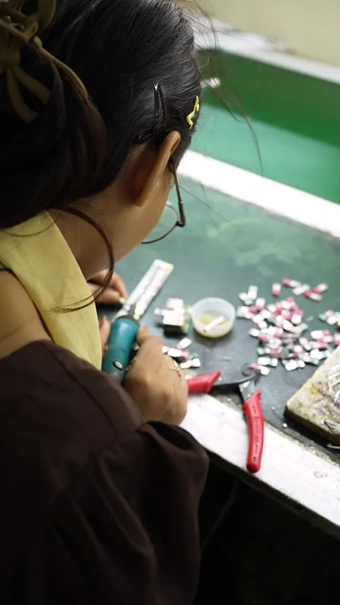 Indian Woman Assembling Electronic Components at Noida Workbench Stock Footage 345810397