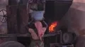 Indian woman bringing a pod on her head to an oven HD Footage