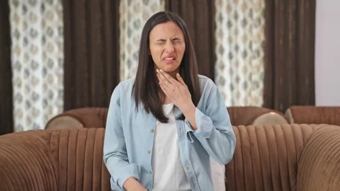 Indian woman having acidity problem Stock Footage 242589125