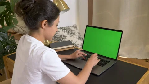 Indian Woman Work on Desktop Computer with Green Mock-up Screen Stock Footage 141033682