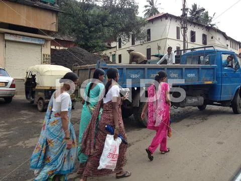 Indian women returning from shopping Stock Photos