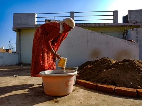 Indian workers on construction site. Stock Photos