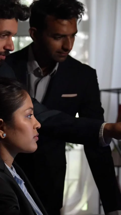 Indian young corporate professionals working in office using laptop Stock Footage 342574487