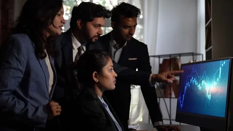 Indian young corporate professionals working in office using laptop Stock Footage 342574637