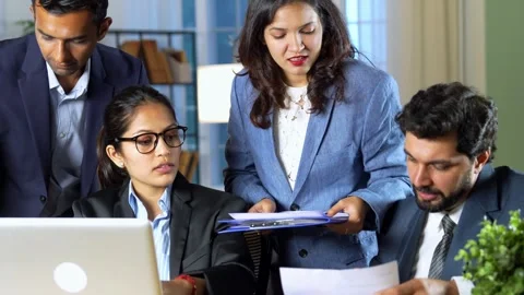 Indian young corporate professionals working in office using laptop Video stock 342574661