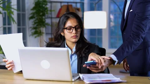 Indian young corporate professionals working in office using laptop Stock Footage 342574667