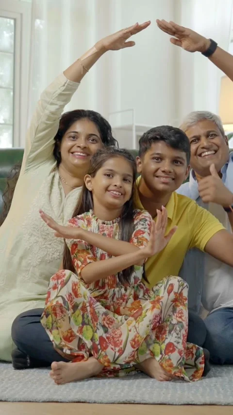Indian young parents and two small kids spending quality time together indoors Stock-Footage 343365145