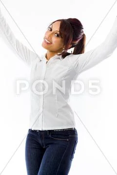 Indian young woman celebrating success isolated on white background Stock Photos