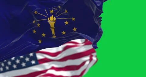 Indiana state flags waving with the US flag isolated on green background Video stock 329769148