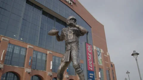 Indianapolis, IN - May 29, 2022: Manning Statue at Indianapolis Colts' Stadium Stock Footage