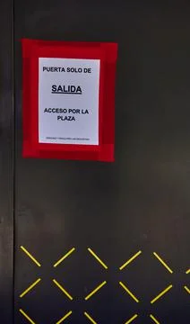 Indication at store exit door during the covid pandemic Photos