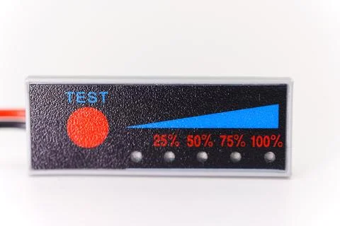 Indicator board shows battery charge level testing in progress Stock Photos