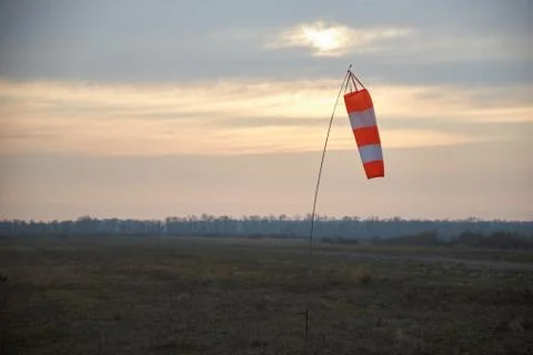 Indicator of speed and wind strength at the aerodrome Stock Photos