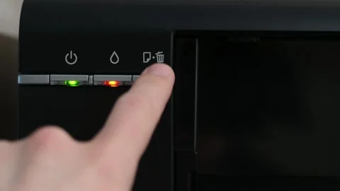 The indicators on the printer are red,the printer is broken,the man knocks on Stock Footage 241259558