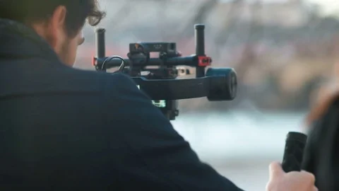 Indie Filmmaker Working with his Model Stock Footage 80229879