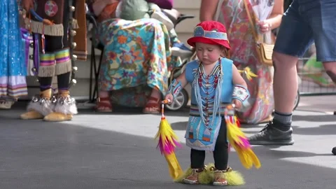 An Indigenous kid dancing during the public event of National Indigenous Family Stock Footage 244555580