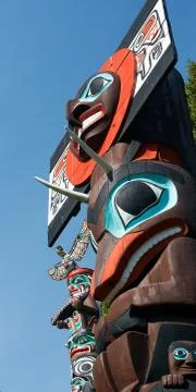 Indigenous people totem pole representing unique culture of the First nations Stock Photos
