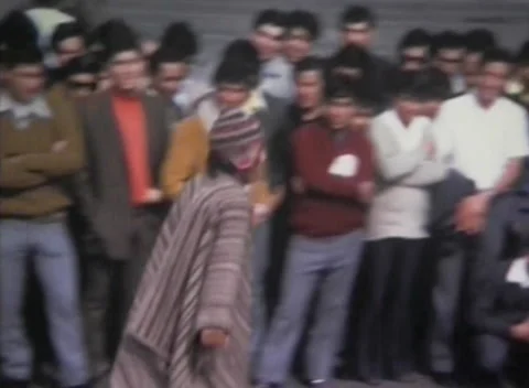 Indigenous Peruvian screams to the people in lima, perù 1973 Stock Footage 231797639