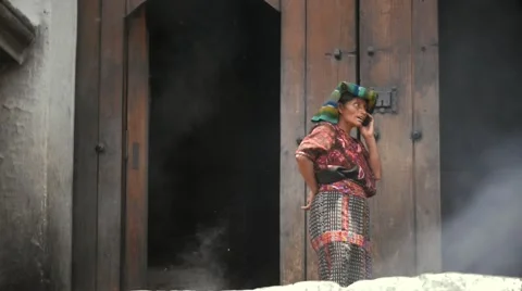 Indigenous using cellphone Stock Footage 50138033