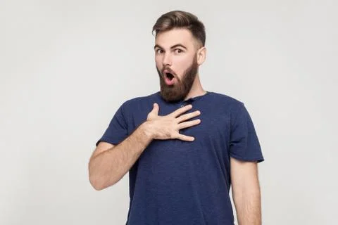 Indignation man looking at camera with shocked face Foto stock