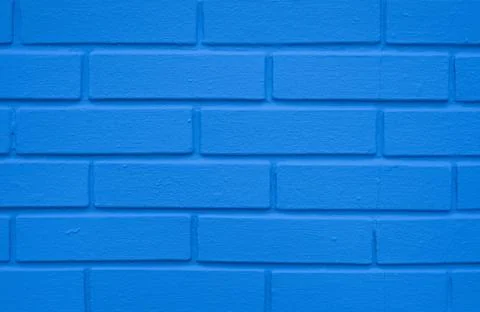 Indigo blue brick wall, construction texture background Stock Photos