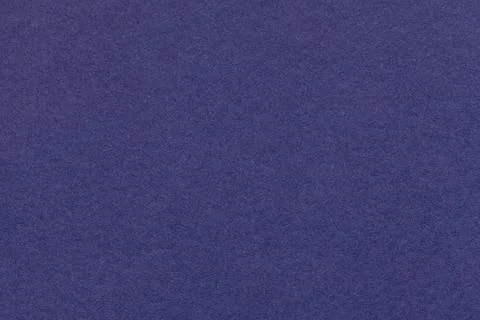 Indigo textured paper background with subtle grain surface and soft structu.. Illustrazione stock