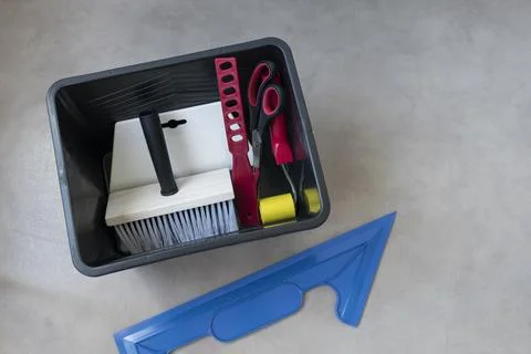 Indispensable tools for wallpapering the walls Stock Photos