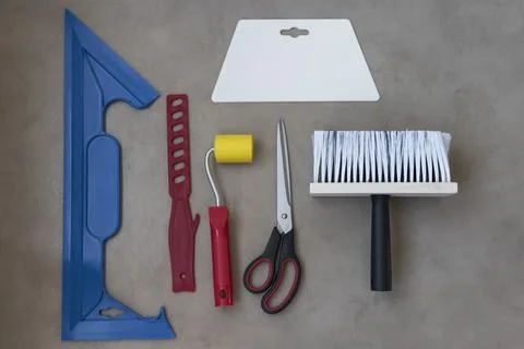 Indispensable tools for wallpapering the walls Foto stock