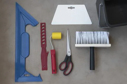 Indispensable tools for wallpapering the walls Stock Photos