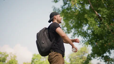 Individual Adjusting Gear While Admiring Vibrant Forest Overhead, Traveler Video stock 327165472