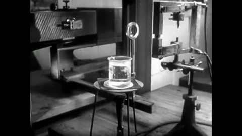 The individual particles of a mixture are broken down at a GM facility in 1937. Stock Footage 83138905