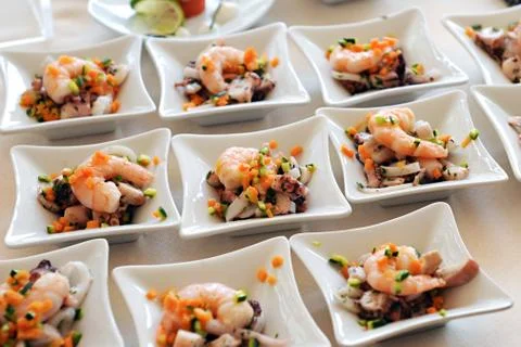 Individual seafood starters Stock Photos