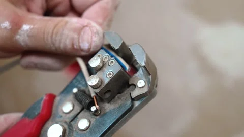 Individual Using Automated Cutter On Cable Insulation And Conductor 스톡 동영상 329106090