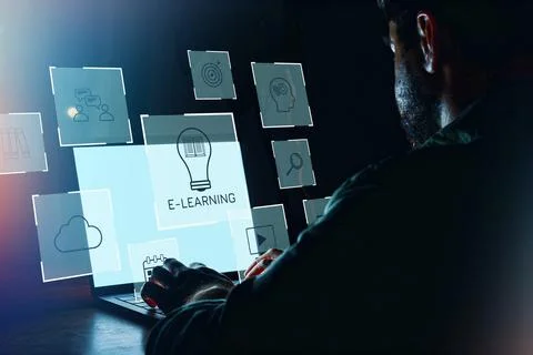 Individual using a laptop for e-learning while exploring various educational Stock Photos