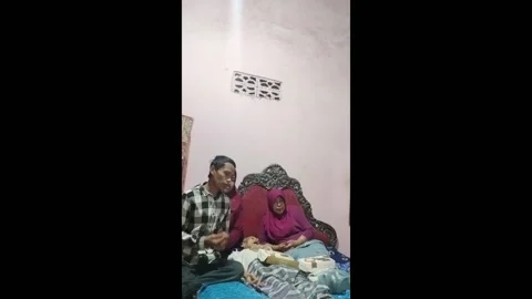 Indonesia: Bed breaks under weight in Kediri, East Java Stock Footage 283589645
