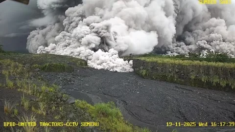 Indonesia: CCTV captures ash cloud emerging during volcano eruption in In... Stock Footage 321444606