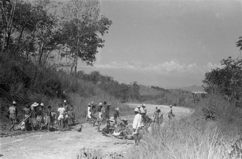 Indonesia. [DLC] Implementation of genie work. Construction of a road. Local wo Stock Photos