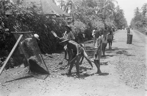 Indonesia. [DLC] Implementation of genie work. Construction of a road. Local wo Stock Photos
