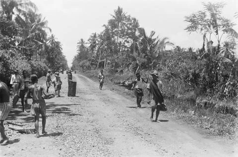 Indonesia. [DLC] Implementation of genie work. Construction of a road. Local wo Stock Photos