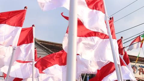 Indonesia flags under blue sky independence day concept Stock Photos