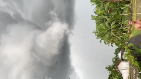 Indonesia: Intense swirling storm clouds create panic in West Java, Indon... Stock Footage 321482203