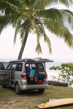 Indonesia, Java, car and surfboard at the coast Photos