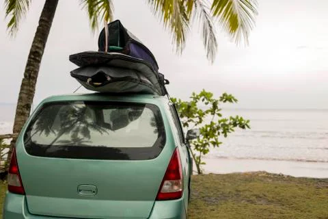 Indonesia, Java, car with surfboards on the roof at the coast Stock Photos