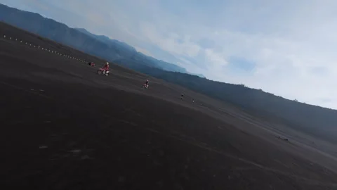 Indonesia, Java, June 12 2024 Enduro motorcyclists riding on volcanic Vídeos de archivo 281574525