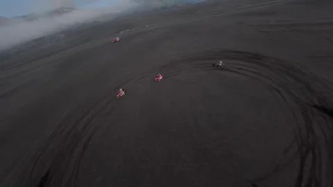 Indonesia, Java, June 12 2024 Enduro motocross volcanic terrain Fpv Drone view Video stock 282564908